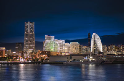 Cosmo clock 21 big wheel, landmark tower and pacifico yokohama national convention hall in yokohama.