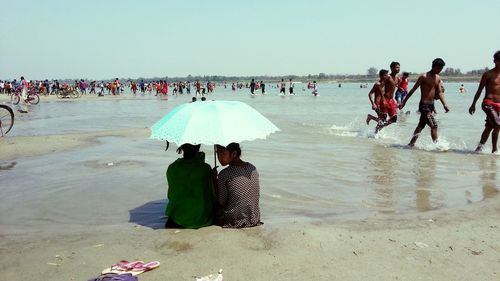 People enjoying at beach
