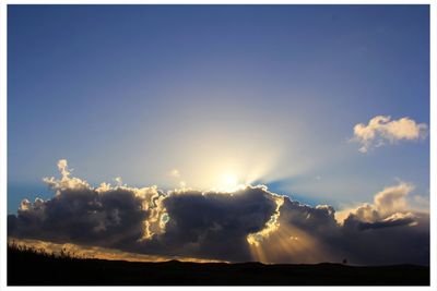 Scenic view of landscape against sky during sunset