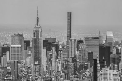 Modern buildings in city against sky