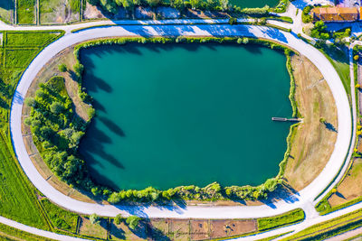 High angle view of swimming pool by lake