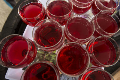 High angle view of red wine glass