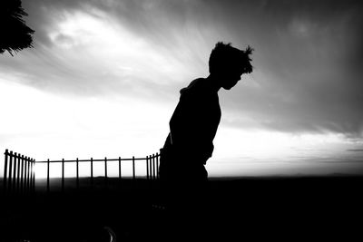 Silhouette of child playing