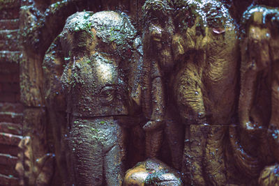 Close-up of buddha statue in temple