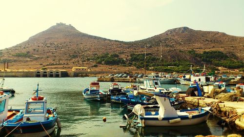 Boats moored in sea