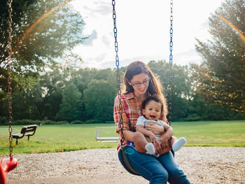 Mother and son on tree