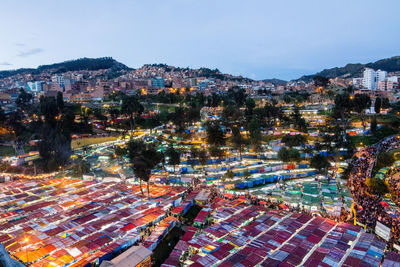 High angle view of illuminated buildings in city