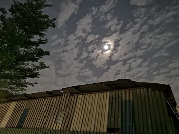 Low angle view of building against sky at night