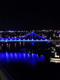 Illuminated cityscape at night