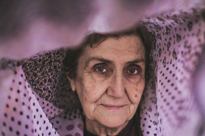 Portrait of senior woman wearing scarf