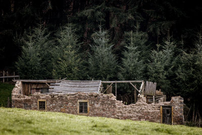 Old stone house falling into ruins