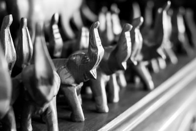 Close-up of figurines on shelf