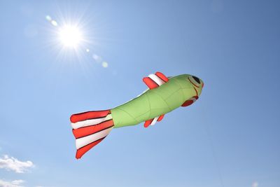 Low angle view of kite against clear sky