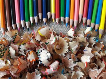 High angle view of multi colored pencils on table