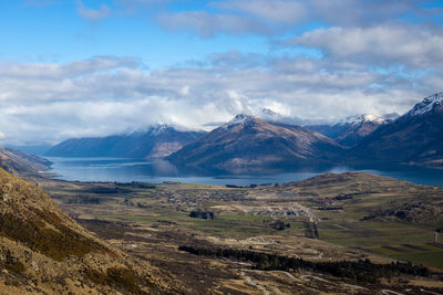 Scenic view of snowcapped mountains against sky