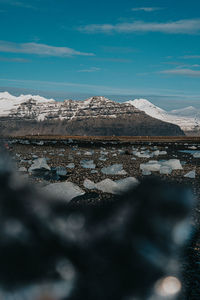 Scenic view of snowcapped mountains against sky