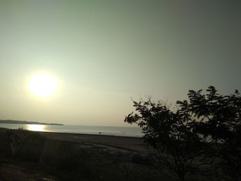 Scenic view of sea against clear sky during sunset