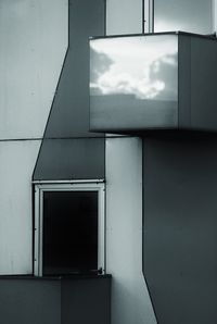 Low angle view of window on wall of building