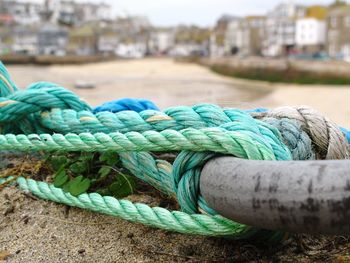 Close-up of rope at harbor