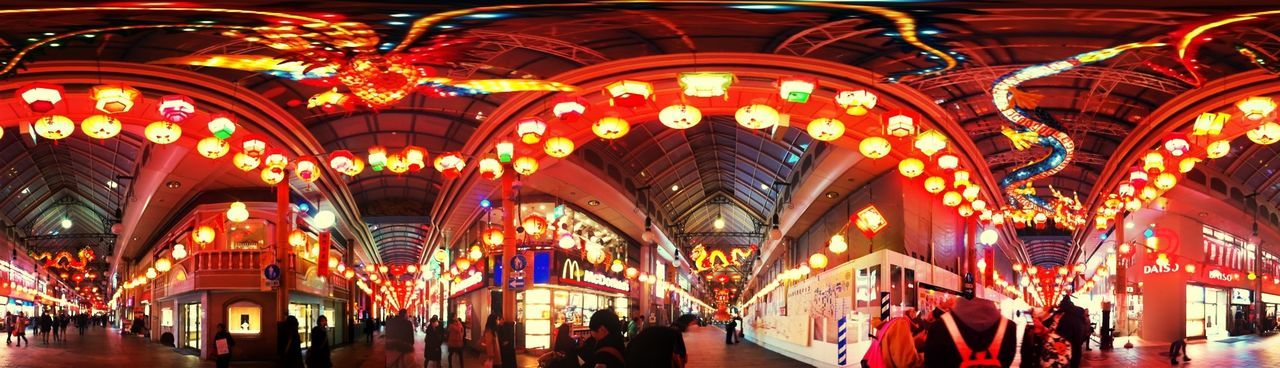 indoors, religion, place of worship, spirituality, arch, illuminated, architecture, ornate, built structure, church, temple - building, decoration, ceiling, low angle view, interior, lighting equipment, in a row, architectural column