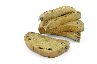 Close-up of bread against white background