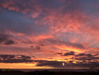 Scenic view of dramatic sky during sunset