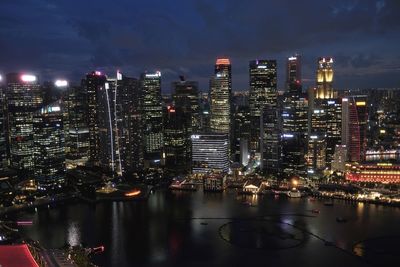 Illuminated buildings in city at night