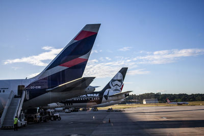 Low angle view of airport runway against sky