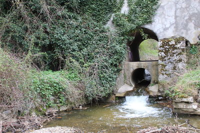 View of water flowing through rocks