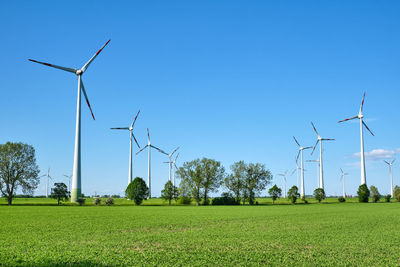 Wind turbines and green fields seen in germany