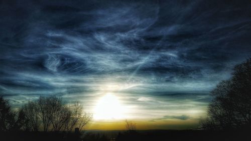 Low angle view of cloudy sky at sunset