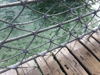 High angle view of rope bridge over river