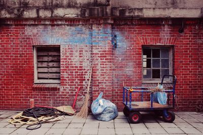 Push cart by outside old building