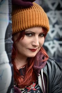 Portrait of young woman in hat