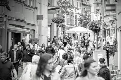 Crowd on street in city