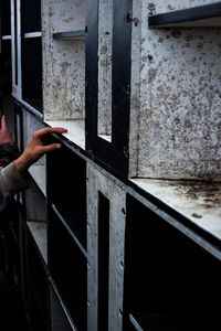 Person holding metal grate