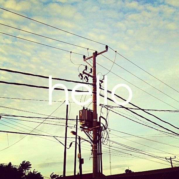 LOW ANGLE VIEW OF POWER LINES AGAINST SKY