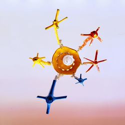 Low angle view of airplane against clear sky