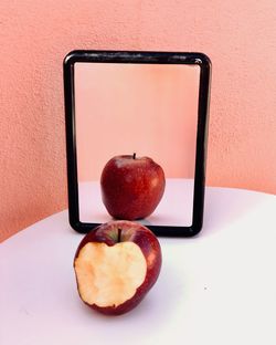 Close-up of apple on table