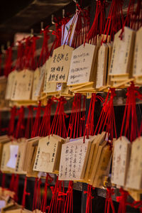 Close-up of text hanging in temple