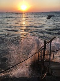 Scenic view of sea against sky during sunset