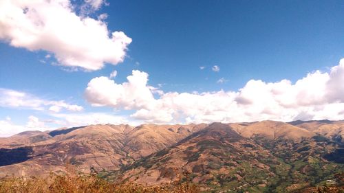 View of landscape against cloudy sky