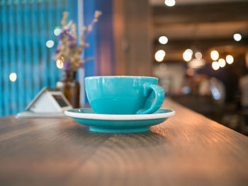 Close-up of coffee cup on table