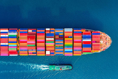 High angle view of multi colored ship at sea 