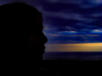 Silhouette of man at sunset