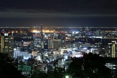 Illuminated cityscape at night