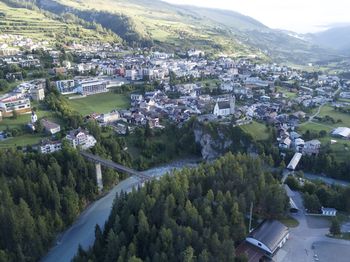 High angle view of townscape and trees in town