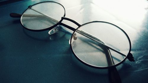 Close-up of eyeglasses on table