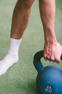 Low section of man with ball