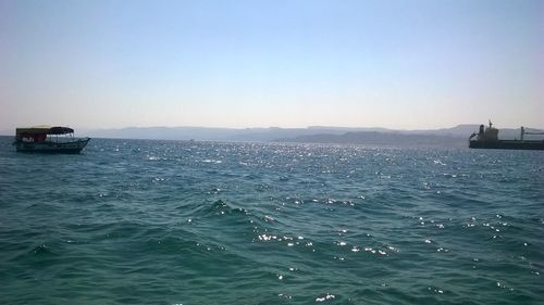 Scenic view of sea against clear sky